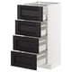 Armoire METOD blanche avec quatre tiroirs en frêne teinté noir.