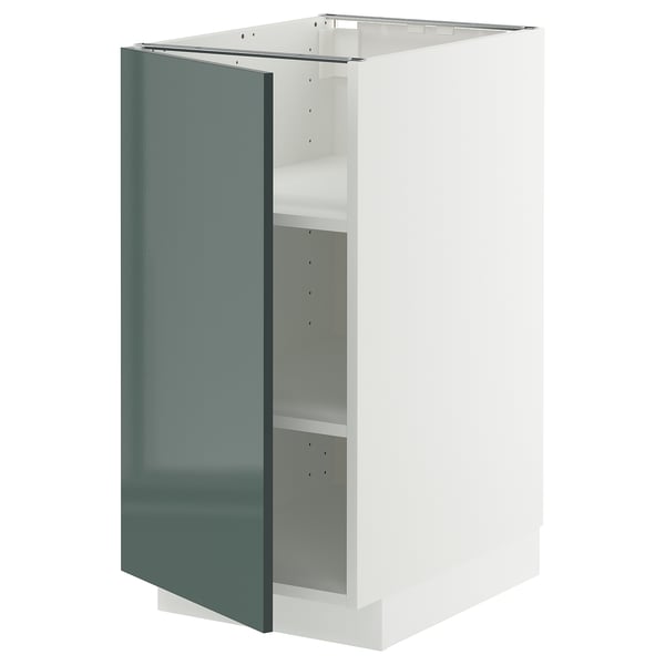 Armoire de cuisine METOD en gris-vert brillant avec cadre blanc et étagère réglable.