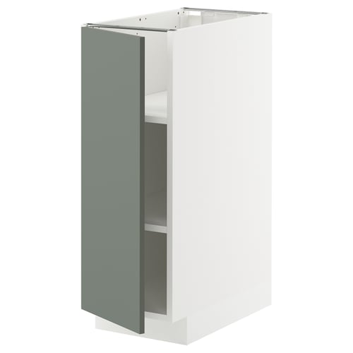 Un meuble de cuisine METOD blanc avec une seule porte en gris-vert mat. Son design moderne, un cadre robuste et des étagères réglables.