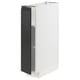 Une armoire de cuisine METOD blanche avec une porte noire mate et une poignée intégrée. L’armoire est rectangulaire avec des étagères réglables.