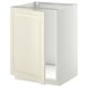 Un meuble bas blanc du système de cuisine METOD avec des portes bodbyn blanc cassé, avec un design traditionnel avec des bords biseautés.