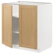 Armoire de cuisine METOD avec portes en chêne et base blanche.