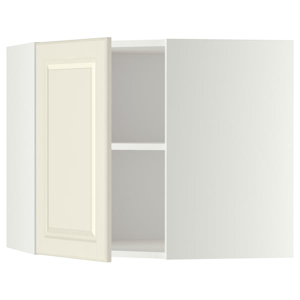 Un meuble de cuisine d’angle METOD en blanc cassé avec une étagère réglable et une porte réversible. Design traditionnel, construction robuste.