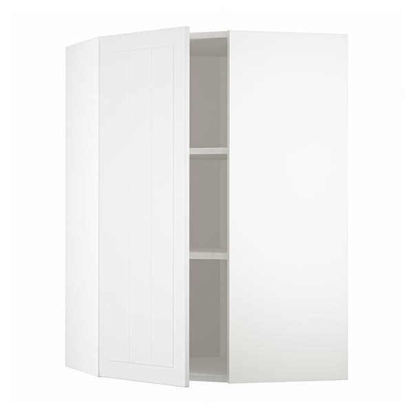 Un meuble d’angle de cuisine METOD blanc avec des étagères réglables et des portes réversibles.
