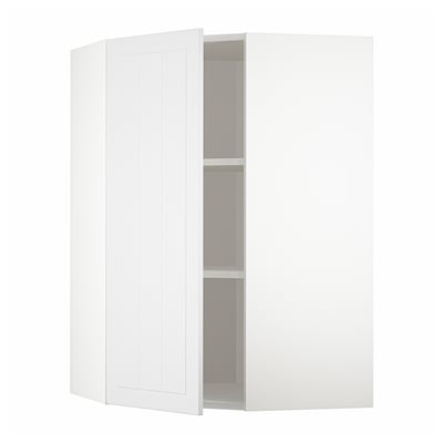 Un meuble d’angle de cuisine METOD blanc avec des étagères réglables et des portes réversibles.