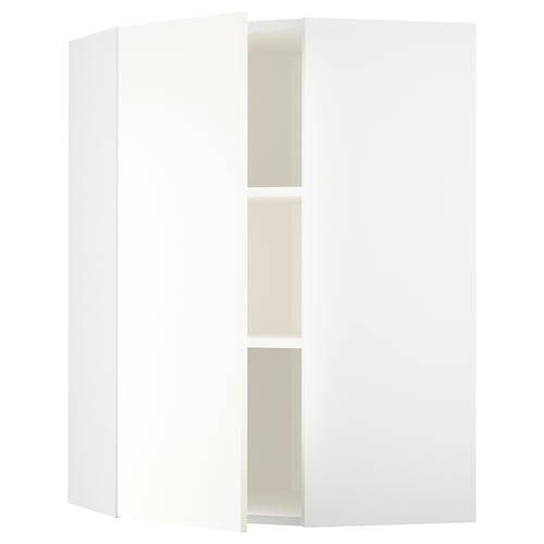 Le meuble d’angle de cuisine METOD en blanc avec étagères orientables.