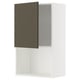 Armoire murale Ikea METOD, blanche, étagère orientable, porte marron foncé.
