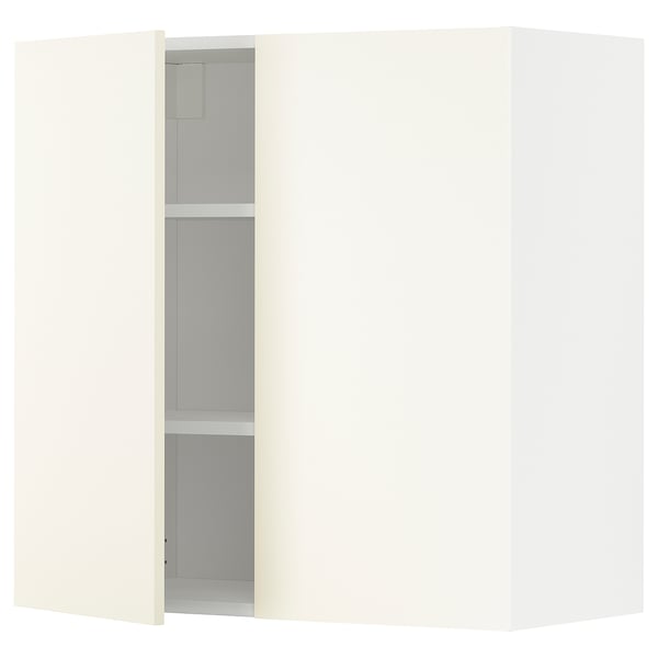 Armoire de cuisine blanche METOD, rectangulaire, design moderne avec une porte ouverte montrant des étagères.