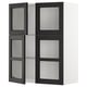 Armoire de cuisine METOD en bois teinté noir avec portes en verre.