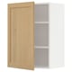 Une armoire de cuisine METOD avec une porte en bois clair, une étagère réglable et un cadre blanc.