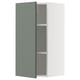 Armoire de cuisine moderne avec porte gris-vert, étagère réglable et porte battante. Extérieur blanc, design minimaliste.