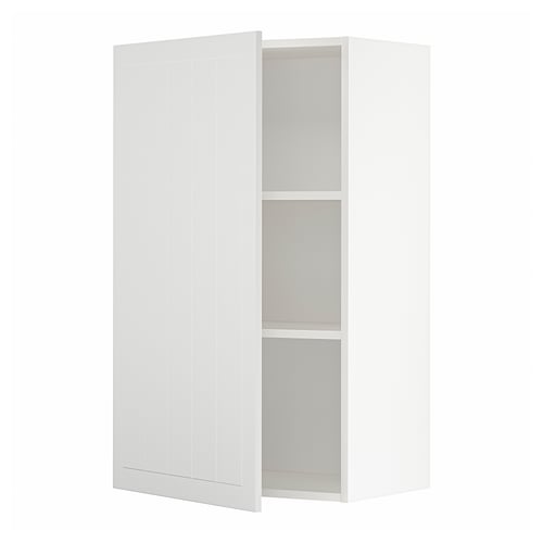 Une armoire murale de cuisine METOD blanche avec une seule porte et des étagères intérieures. L’armoire est rectangulaire et a un design moderne.