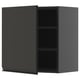 Armoire de cuisine noire moderne avec un design élégant sans poignée et deux étagères.
