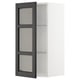 Armoire blanche moderne avec porte en frêne teinté foncé, étagère en verre réglable.