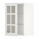 Un meuble de cuisine METOD blanc avec des portes vitrées, au design moderne et épuré.