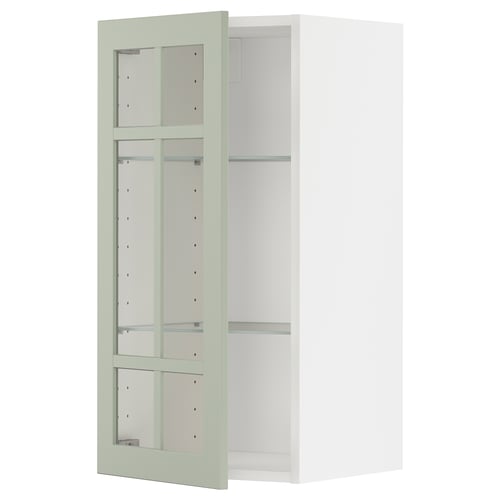 Armoire de cuisine METOD : portes en verre vert, cadre blanc, étagères réglables, design à 3 compartiments.