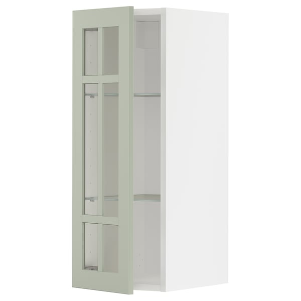 Armoire de cuisine METOD avec portes en verre vert stenund, cadre blanc, rectangulaire, design moderne.