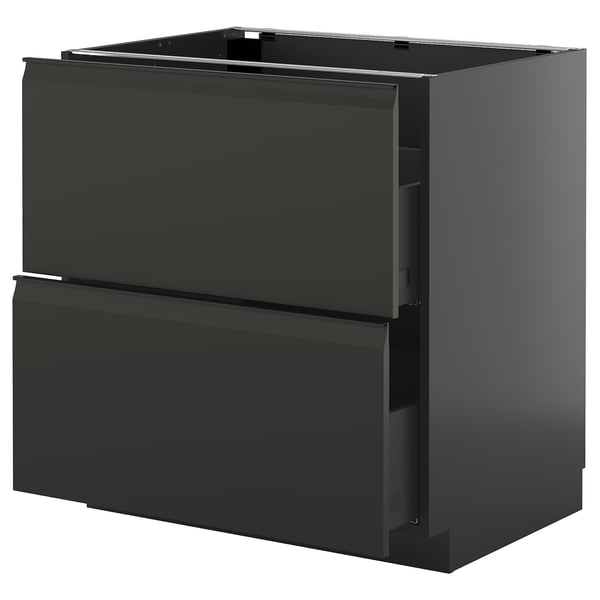 Armoire de cuisine noire moderne avec tiroirs élégants sans poignée.