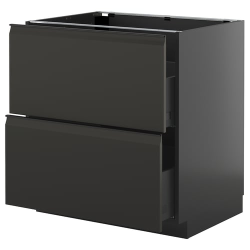 Armoire de cuisine noire moderne avec tiroirs élégants sans poignée.
