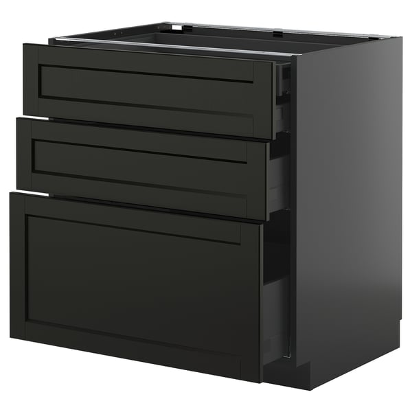 Unité de cuisine noire avec tiroirs, design moderne.