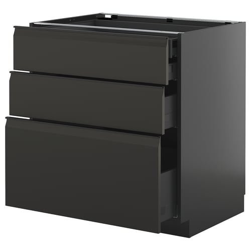 Armoire de cuisine noire moderne avec poignées lisses et plusieurs tiroirs.