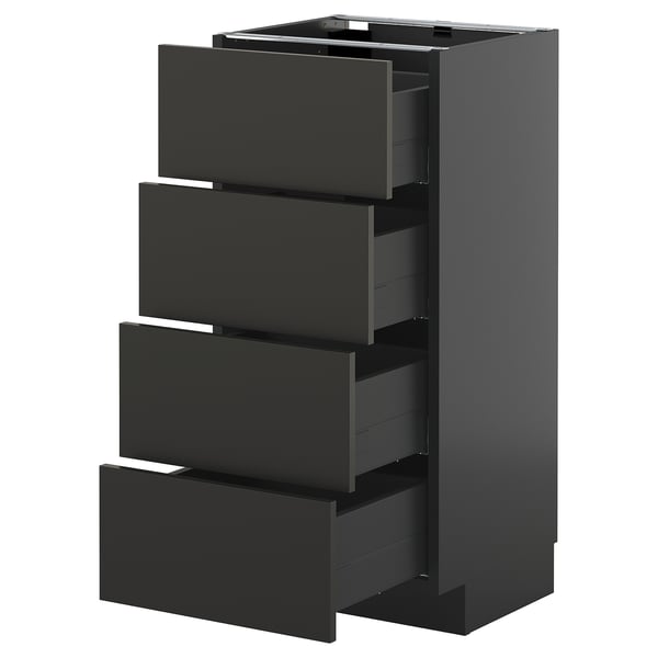 Armoire de cuisine moderne noire METOD avec quatre tiroirs ouverts.