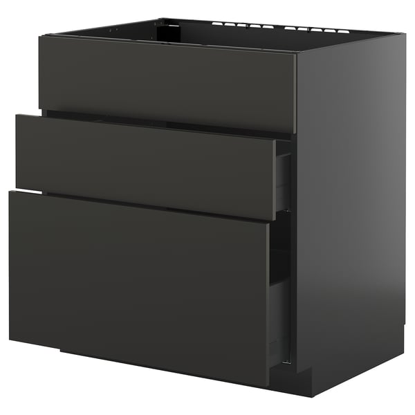 Armoire de cuisine noire moderne avec tiroirs lisses.
