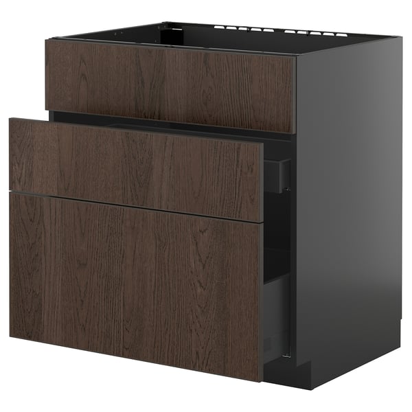 Une armoire de cuisine en bois brun foncé au design élégant et moderne. Il comporte plusieurs tiroirs et une base métallique.