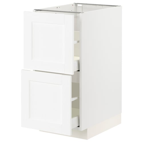 Armoire de cuisine blanche avec deux tiroirs et étagères, design moderne.