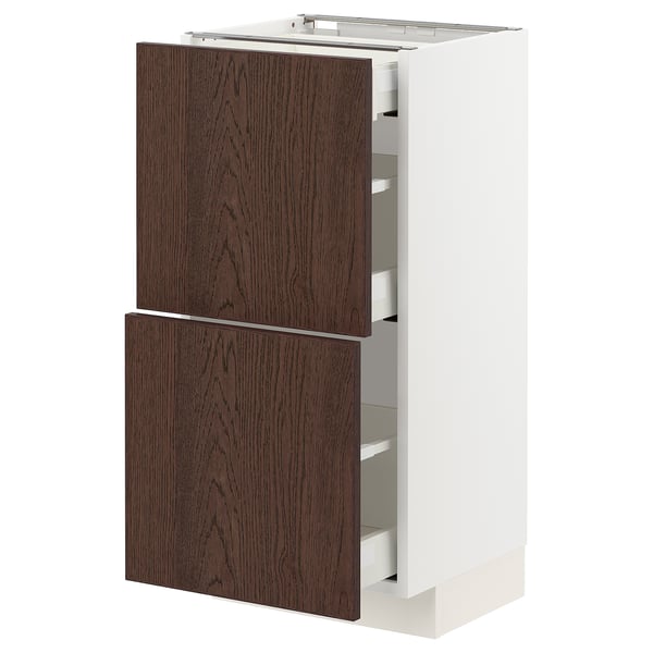 Armoire de cuisine ikea METOD blanche avec tiroirs en bois brun foncé.