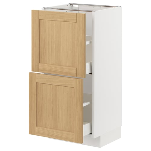 Meuble de cuisine METOD avec tiroirs en chêne et base blanche.