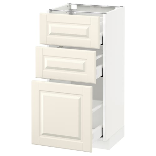 Un meuble de cuisine METOD blanc avec trois tiroirs et une porte. Le design a des bords biseautés et un look traditionnel.