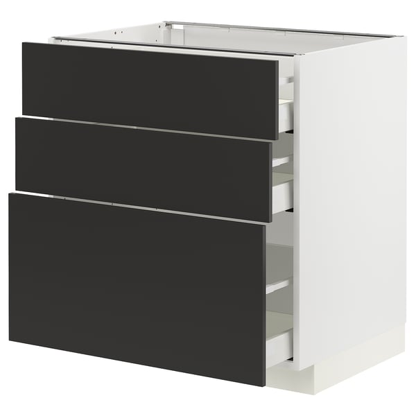 Armoire de cuisine METOD moderne noire avec trois tiroirs ouverts.
