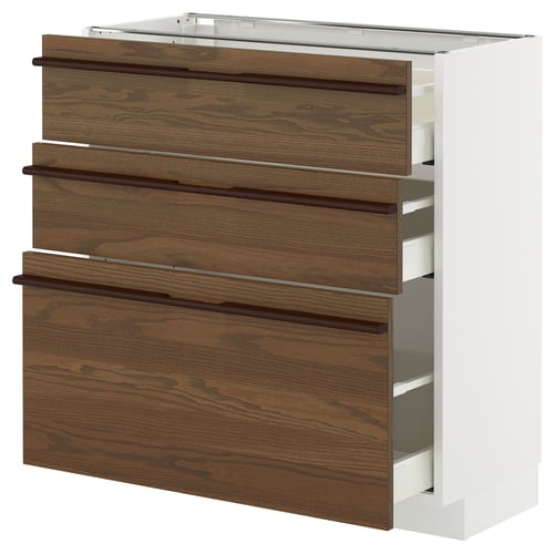 Meuble de cuisine METOD avec tiroirs en placage de frêne brun foncé et poignées en bois.