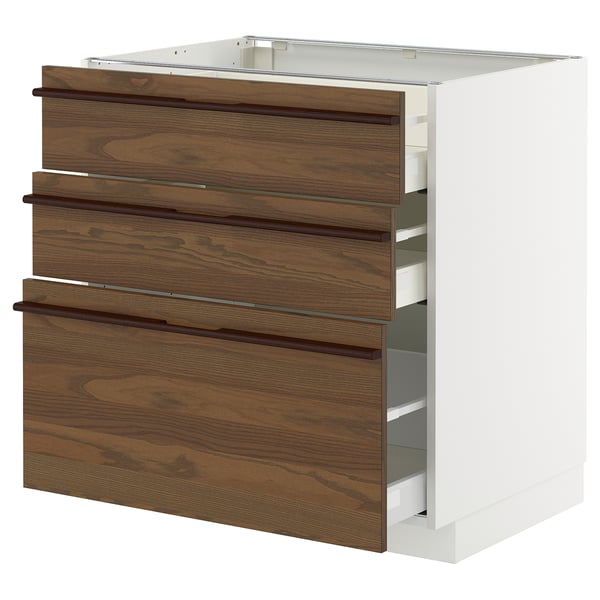Armoire de cuisine METOD blanche avec tiroirs brun foncé.