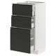 Armoire de cuisine moderne en noir et blanc avec des tiroirs élégants.