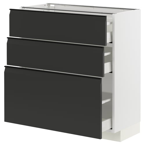 Unité de cuisine moderne en noir et blanc avec trois tiroirs et un design élégant.