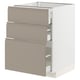 Armoire de cuisine beige moderne avec poignées intégrées et plusieurs tiroirs.