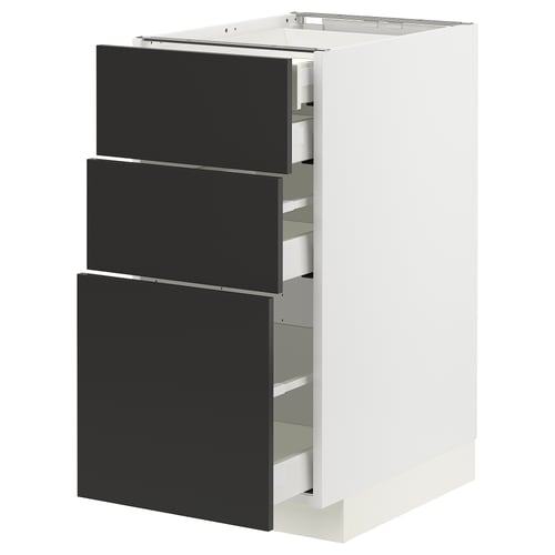 Armoire de cuisine METOD moderne blanche avec trois tiroirs noirs.