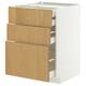 Un meuble de cuisine IKEA METOD avec trois tiroirs en chêne clair. L’armoire est blanche avec des tiroirs lisses à fermeture automatique.