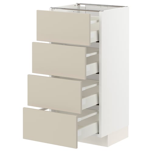 Meuble de cuisine METOD avec quatre tiroirs beiges, façades lisses et propres, s’ouvre entièrement avec fermeture automatique.