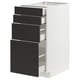 Armoire Ikea METOD blanche avec quatre tiroirs noirs.