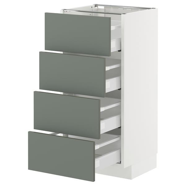 Unité Ikea METOD, gris-vert, quatre tiroirs, cadre blanc, design épuré.