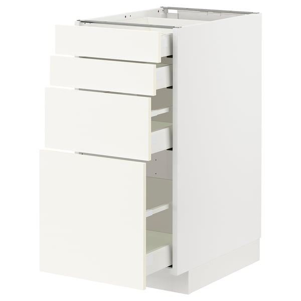 Unité de cuisine METOD blanche avec plusieurs tiroirs coulissants. Design moderne et minimaliste, idéal pour organiser les articles de cuisine.
