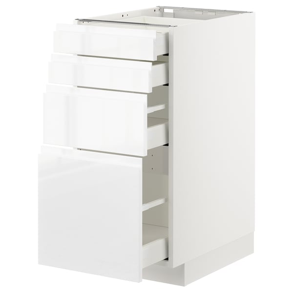 Un meuble de cuisine METOD en blanc brillant. Il y a plusieurs tiroirs auto-fermants, offrant à la fois un design moderne et un rangement pratique.