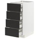 Armoire METOD blanche avec 4 tiroirs noirs à fermeture automatique.