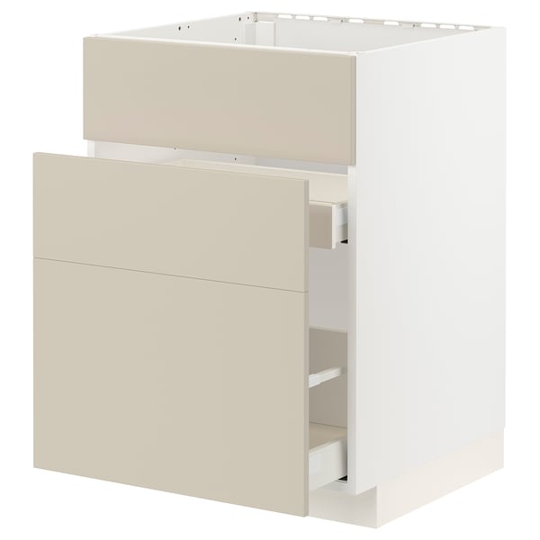 Un meuble de cuisine METOD blanc avec des façades havstorp beiges, avec des surfaces lisses et un design moderne.