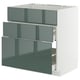 Armoire de cuisine moderne en gris-vert brillant avec trois tiroirs.