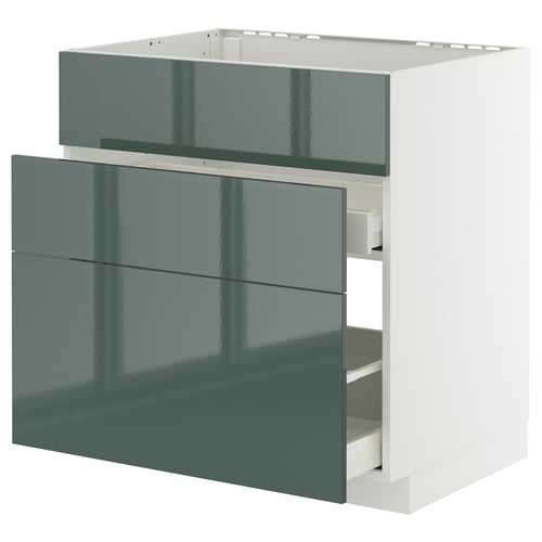Armoire de cuisine moderne gris-vert brillant avec trois tiroirs.