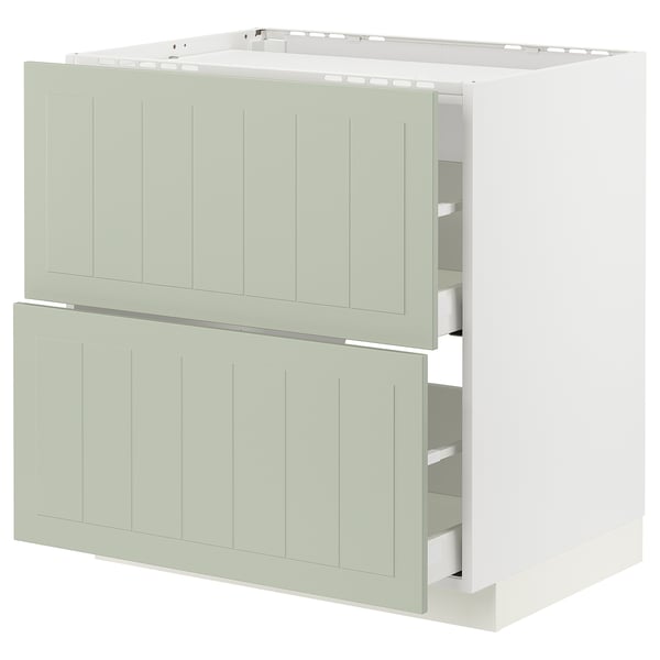 Cette image montre une armoire de cuisine ikea METOD verte avec deux tiroirs et une base blanche. Il s’agit d’un design simple et moderne adapté à une cuisine contemporaine.